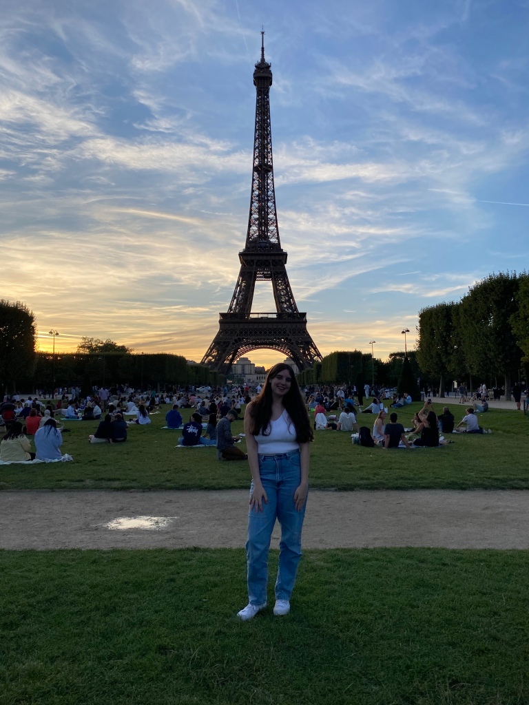 Me underneath the Eiffel Tower during the sunset